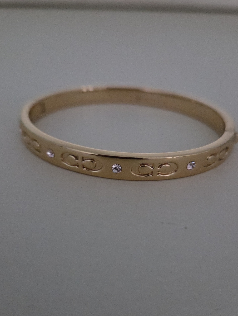 Coach Gold-Tone Logo & Crystal Bangle Bracelet